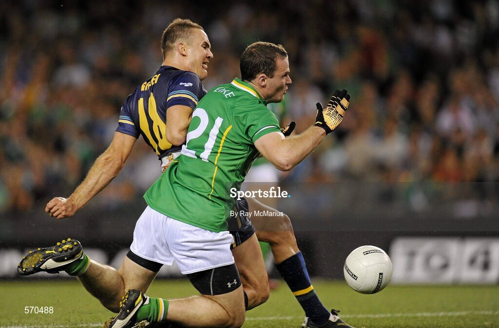 28 October 2011; The Australia captain Brad Green shoots past Ireland's Neil McGee to score a goal in the second quarter. International Rules 1st Test, Australia v Ireland, Etihad Stadium, Melbourne, Australia. Picture credit: Ray McManus / SPORTSFILE