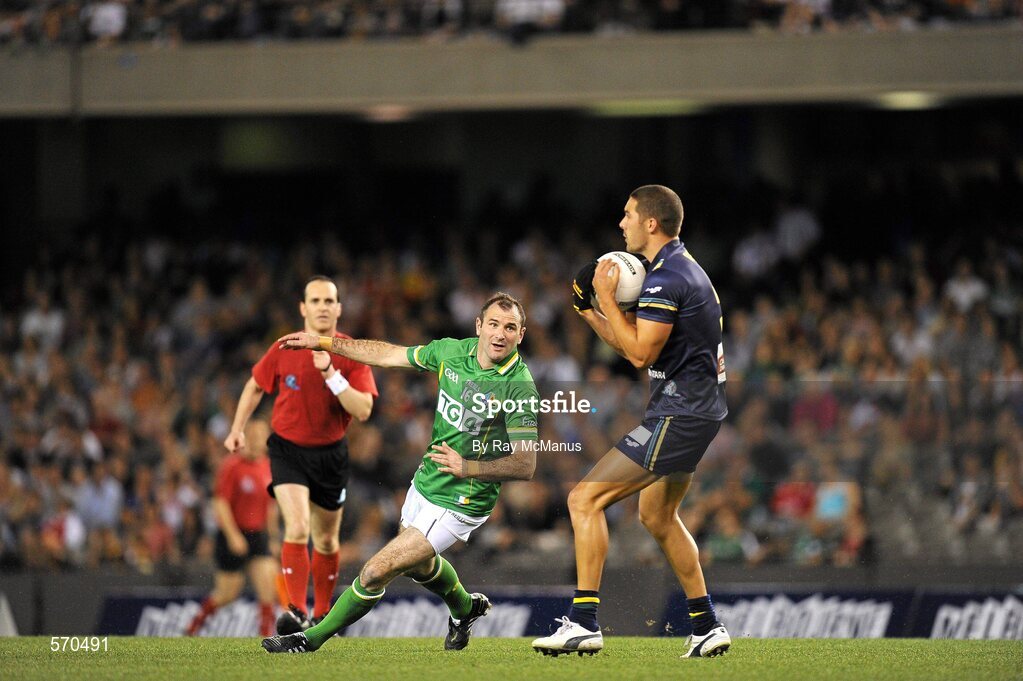 28 October 2011; Shaun Grigg, Australia, in action against Steven McDonnell, Ireland. International Rules 1st Test, Australia v Ireland, Etihad Stadium, Melbourne, Australia. Picture credit: Ray McManus / SPORTSFILE