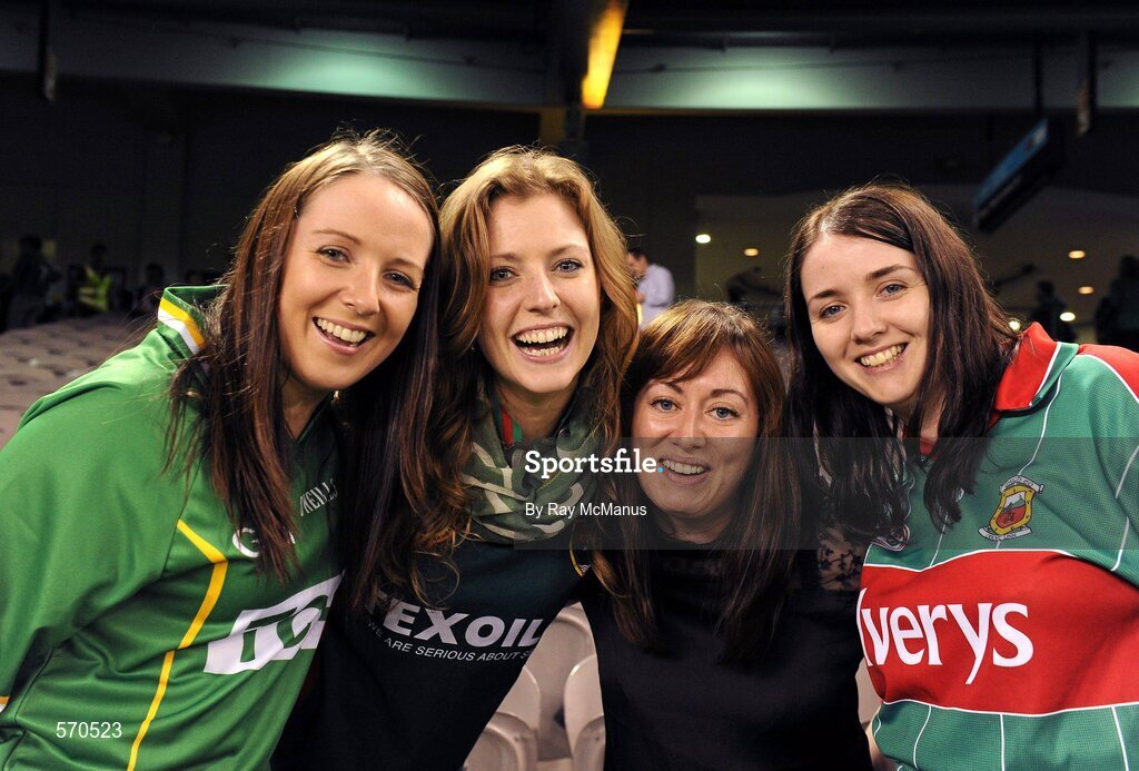 28 October 2011; Mayo girls, from left to right, Lorna Rooney, from Achill Island, Heather Jordan, from Bohola, Liz Burke, from Ballyhaunis, and Helen Gallagher, from Achill Island, celebrate Ireland's win in the first test over Australia. International Rules 1st Test, Australia v Ireland, Etihad Stadium, Melbourne, Australia. Picture credit: Ray McManus / SPORTSFILE