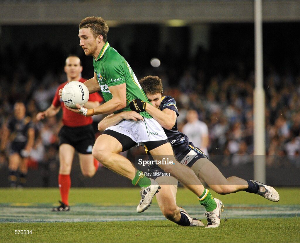 28 October 2011; Zach Tuohy, Ireland, in action against Liam Shiels, Australia. International Rules 1st Test, Australia v Ireland, Etihad Stadium, Melbourne, Australia. Picture credit: Ray McManus / SPORTSFILE