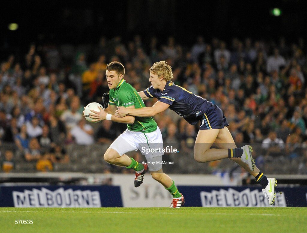 28 October 2011; Eoin Cadogan, Ireland, in action against Trent McKenzie, Australia. International Rules 1st Test, Australia v Ireland, Etihad Stadium, Melbourne, Australia. Picture credit: Ray McManus / SPORTSFILE