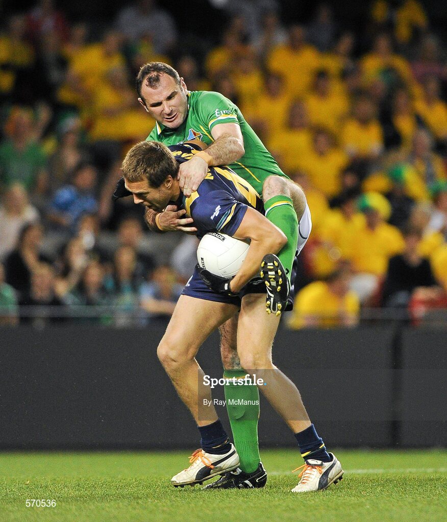 28 October 2011; Steven McDonnell, Ireland, tackles David Wojcinski, Australia. International Rules 1st Test, Australia v Ireland, Etihad Stadium, Melbourne, Australia. Picture credit: Ray McManus / SPORTSFILE