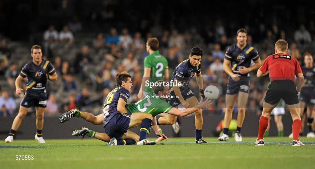 28 October 2011; Patrick Kelly, Ireland, in action against Richard Douglas, Australia. International Rules 1st Test, Australia v Ireland, Etihad Stadium, Melbourne, Australia. Picture credit: Ray McManus / SPORTSFILE