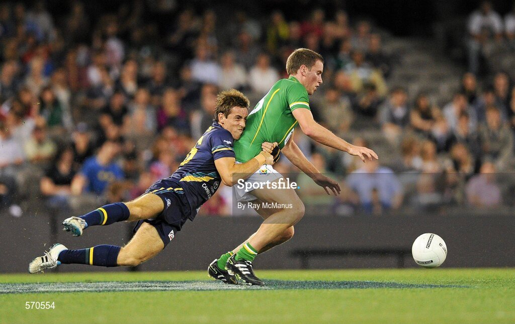 28 October 2011; Patrick Kelly, Ireland, in action against Richard Douglas, Australia. International Rules 1st Test, Australia v Ireland, Etihad Stadium, Melbourne, Australia. Picture credit: Ray McManus / SPORTSFILE