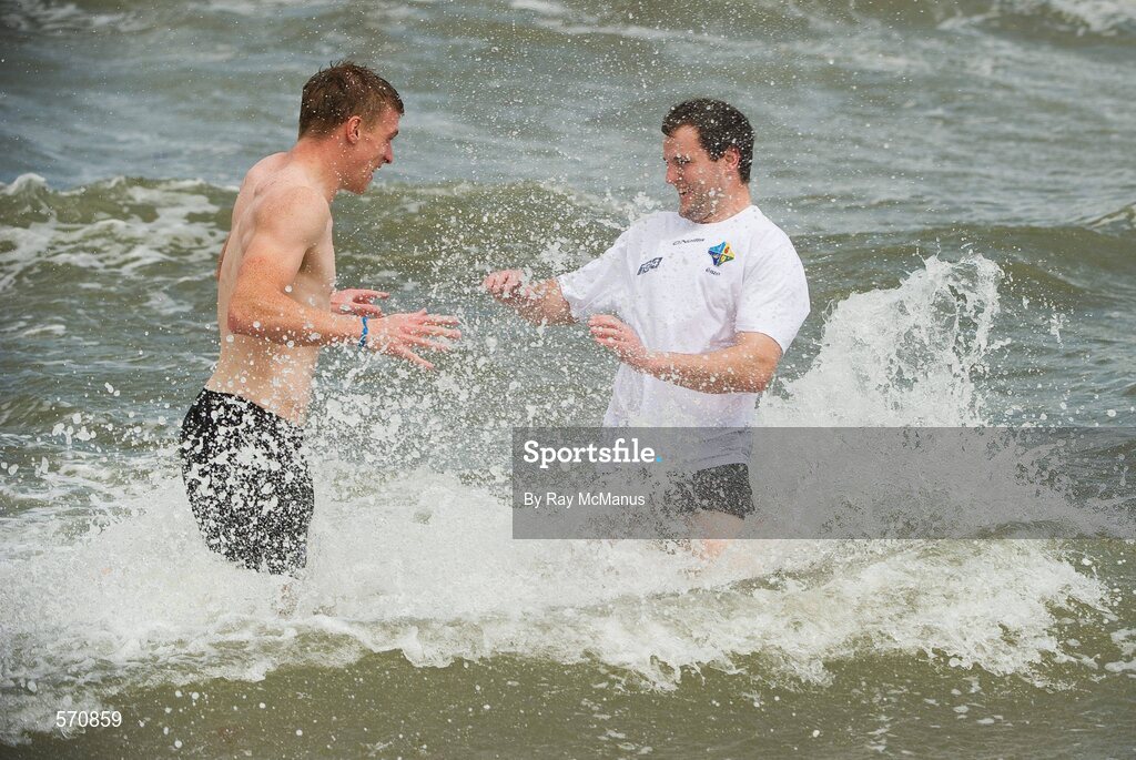 30 October 2011;Tommy Walsh, left, and Michael Murphy splash about as members of the Ireland  International Rules Series 2011 team relax on St Kilda Beach, Melbourne Bay, Australia. Picture credit: Ray McManus / SPORTSFILE