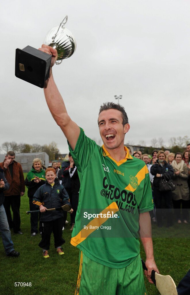 30 October 2011; Kill captain Ronan Kelly lifts the cup after the game. Intermediate B Championship Final, Kill v Confey, Naas GAA Ground, Co. Kildare. Picture credit: Barry Cregg / SPORTSFILE