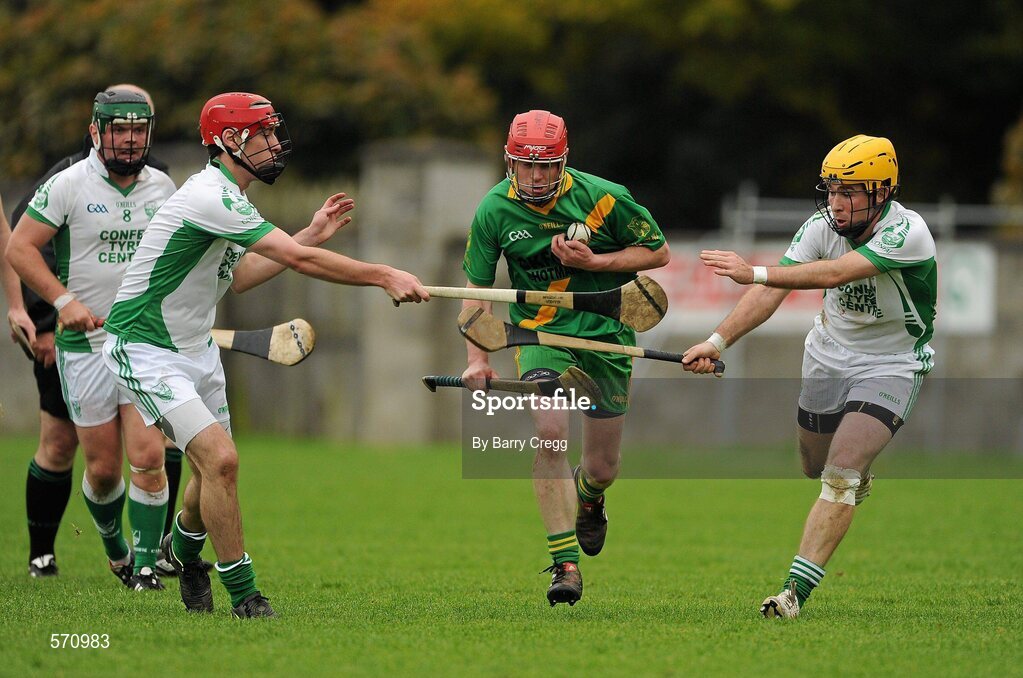 30 October 2011; Kevin Crowe, Kill, in action against Conor Delaney, left, and Roger Quinn, right, Confey. Intermediate B Championship Final, Kill v Confey, Naas GAA Ground, Co. Kildare. Picture credit: Barry Cregg / SPORTSFILE