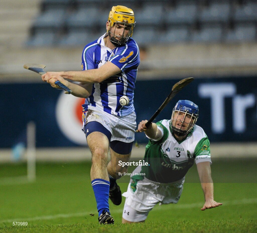 30 October 2011; Conor McCormack, Ballyboden St Enda's, shoots to score his side's third goal despite Michael Cunningham, O'Toole's. Dublin County Senior Huling Championship Final, Ballyboden St Enda's v O'Toole's, Parnell Park, Dublin. Picture credit: Brian Lawless / SPORTSFILE