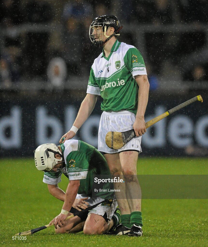 30 October 2011; Gerard O'Meara, left, and team-mate Kevin Ryan, O'Toole's, in the final minutes of the match. Dublin County Senior Huling Championship Final, Ballyboden St Enda's v O'Toole's, Parnell Park, Dublin. Picture credit: Brian Lawless / SPORTSFILE