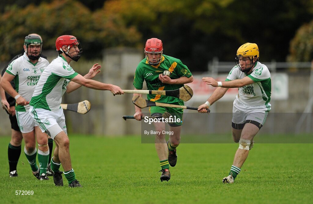30 October 2011; Kevin Crowe, Kill, in action against Conor Delaney, left, and Roger Quinn, right, Confey. Intermediate B Championship Final, Kill v Confey, Naas GAA Ground, Co. Kildare. Picture credit: Barry Cregg / SPORTSFILE