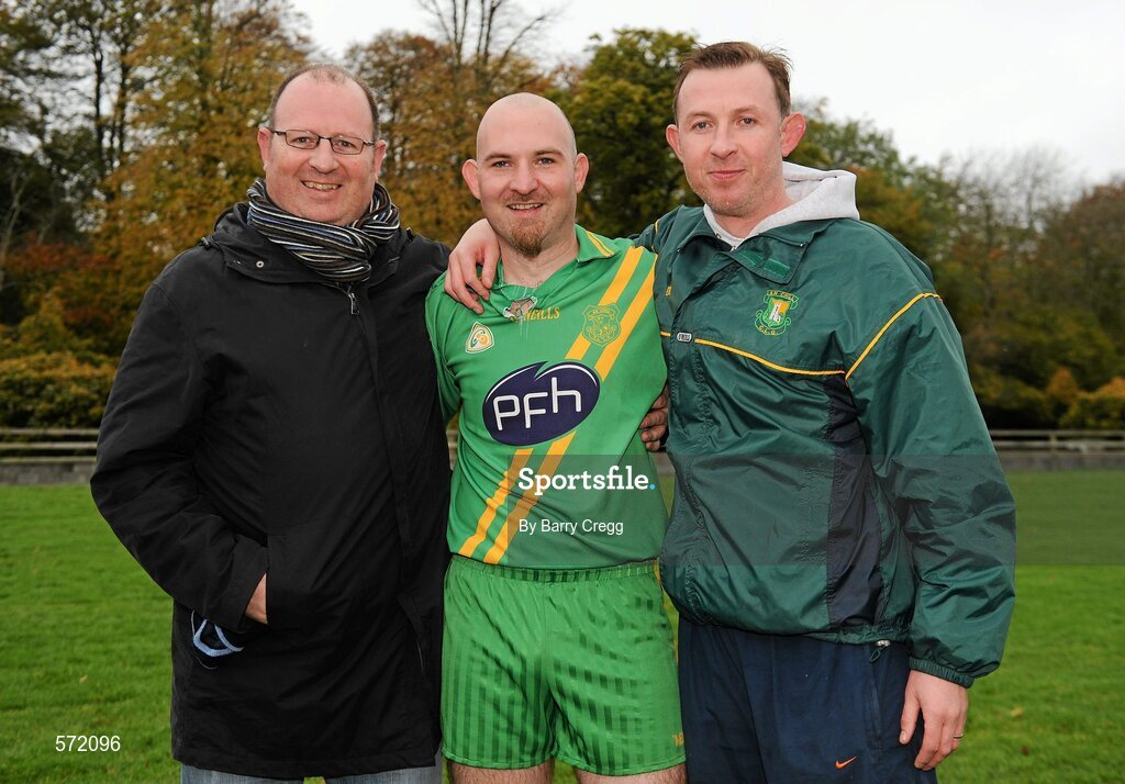 30 October 2011; The Kelly brothers, from left to right, Michael, Eamonn and Pairic, from Kill, Co. Kildare, after their victory over Confey. Intermediate B Championship Final, Kill v Confey, Naas GAA Ground, Co. Kildare. Picture credit: Barry Cregg / SPORTSFILE