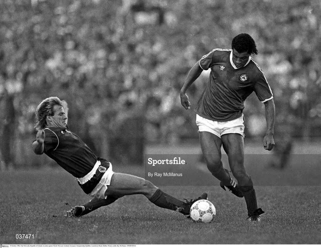 15 October 1986; Paul McGrath of Republic of Ireland in action against Murdo McLeod of Scotland. European Championship Qualifier, Lansdowne Road, Dublin. Picture credit: Ray McManus / SPORTSFILE