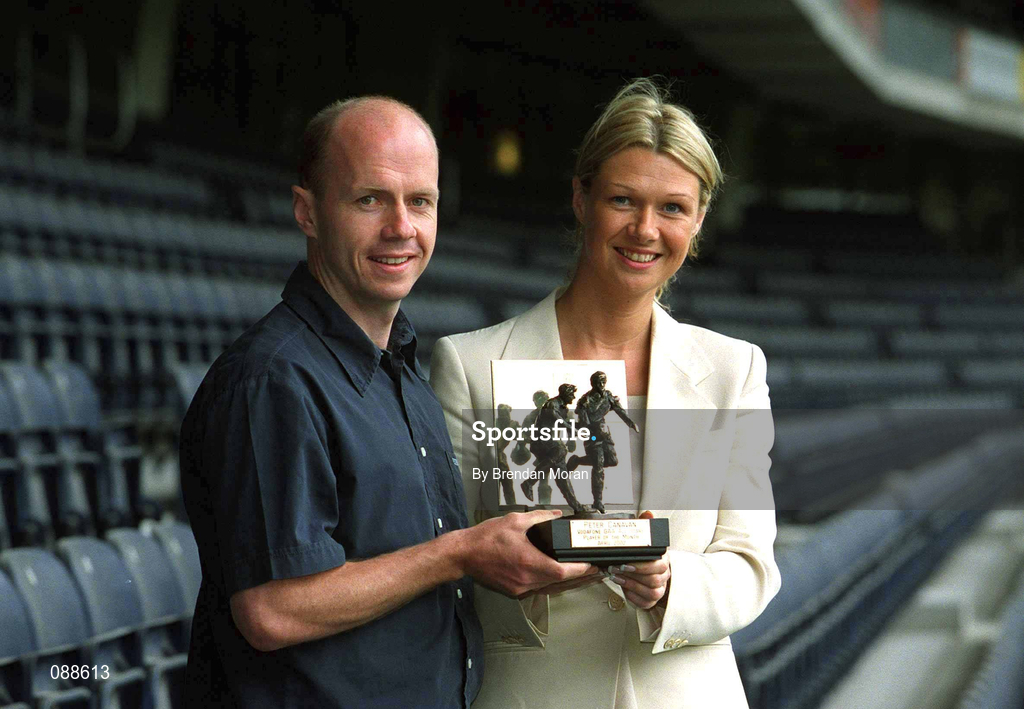 21 May 2002; Tyrone's Peter Canavan is presented with his Vodafone GAA All-Stars Player of the Month award for April by Tara Delaney, Communications Director of Vodafone, at Croke Park in Dublin. It was his second award of the year, having previously received the award for February 2002. Photo by Brendan Moran/Sportsfile