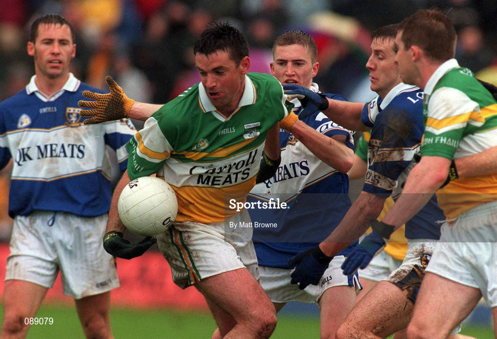 26 May 2002; Sean Grennan of Offaly is tackled by Joe Higgins of Laois during the Bank of Ireland Leinster Senior Football Championship Quarter-Final match between Offaly and Laois at O'Connor Park in Tullamore, Offaly. Photo by Matt Browne/Sportsfile