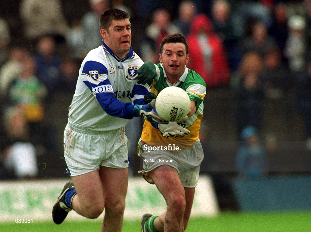 26 May 2002; Fergal Byron of Laois is tackled by Sean Grennan of Offaly during the Bank of Ireland Leinster Senior Football Championship Quarter-Final match between Offaly and Laois at O'Connor Park in Tullamore, Offaly. Photo by Matt Browne/Sportsfile