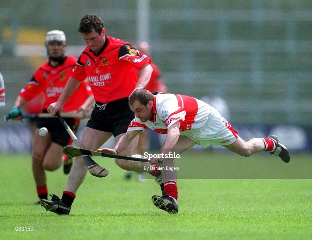 25 May 2002; Colin McEldowney of Derry in action against Michael Braniff of Down during the Guinness Ulster Senior Hurling Championship Semi-Final match between Down and Derry at Casement Park in Belfast. Photo by Damien Eagers/Sportsfile