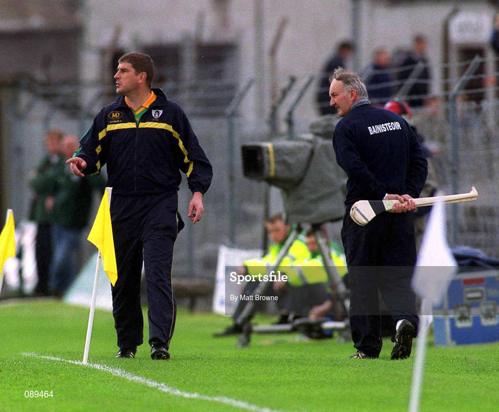 26 May 2002; Meath manager Michael Duignan, left, passes Dublin manager Kevin Fennelly during the Guinness Leinster Senior Hurling Championship Quarter-Final match between Dublin and Meath at O'Connor Park in Tullamore, Offaly. Photo by Matt Browne/Sportsfile