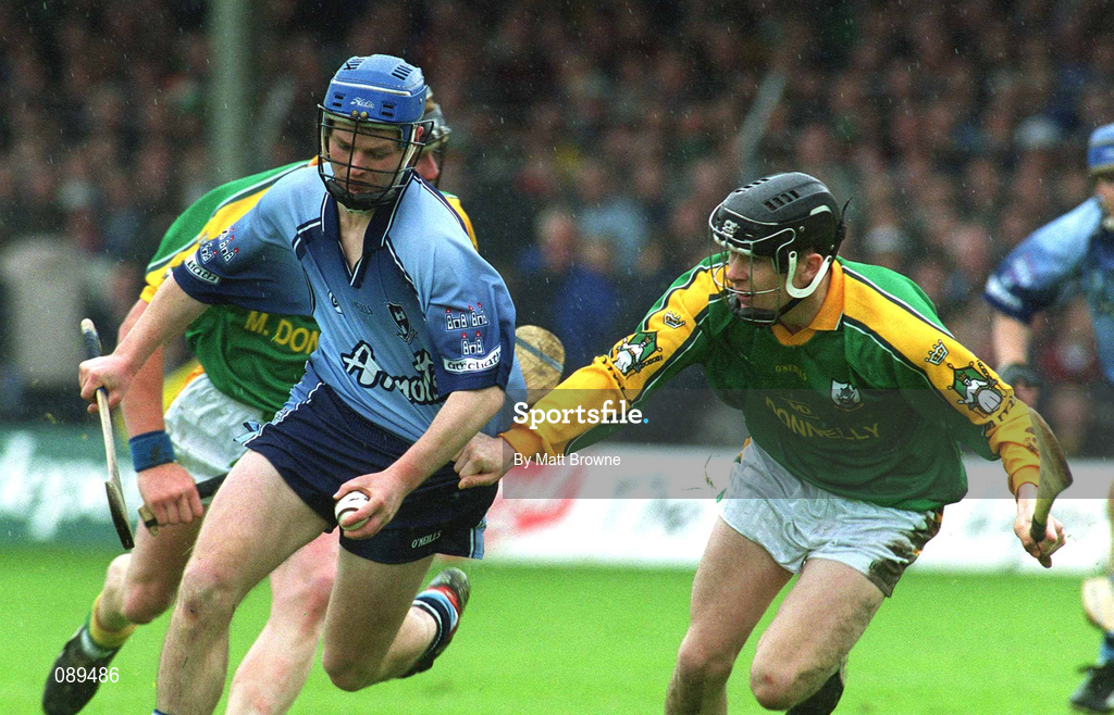 26 May 2002; Tomas McGrane of Dublin in action against Paul Gannon of Meath during the Guinness Leinster Senior Hurling Championship Quarter-Final match between Dublin and Meath at O'Connor Park in Tullamore, Offaly. Photo by Matt Browne/Sportsfile