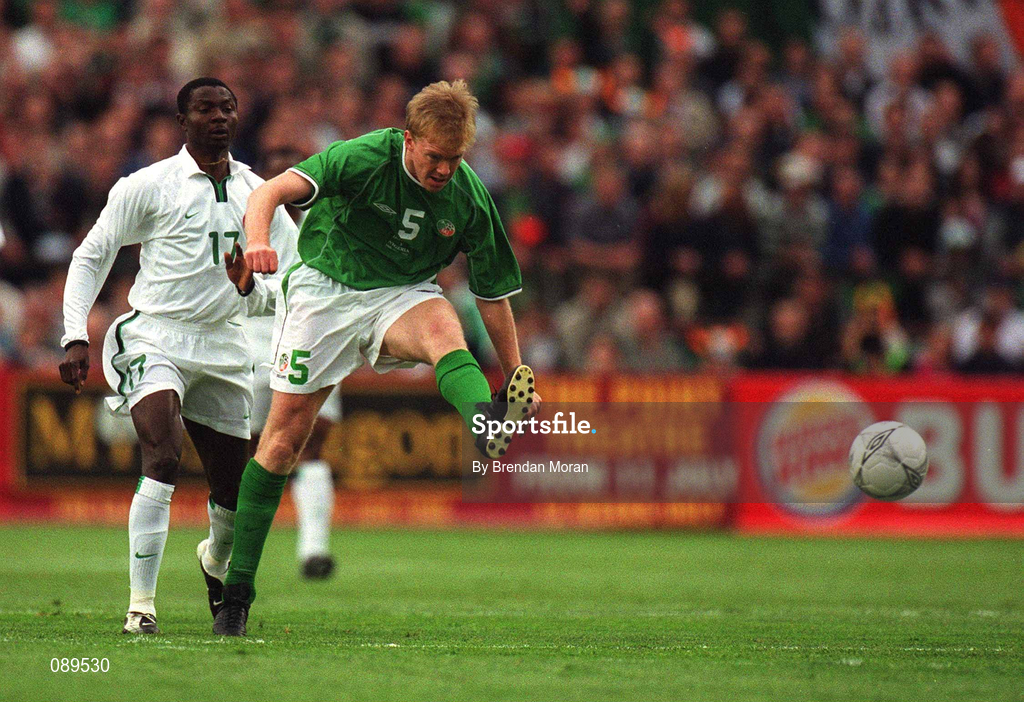 16 May 2002; Steve Staunton of Republic of Ireland in action against Julius Aghahowa of Nigeria during the International Friendly match between Republic of Ireland and Nigeria at Lansdowne Road in Dublin. Photo by Brendan Moran/Sportsfile
