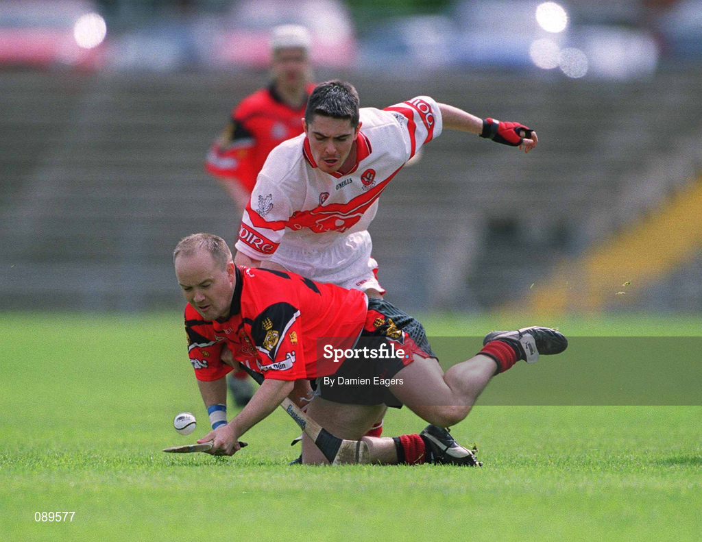 25 May 2002; Martin Coulter Jnr of Down in action against Derry's Ryan Lynch during the Guinness Ulster Senior Hurling Championship Semi-Final match between Down and Derry at Casement Park in Belfast. Photo by Damien Eagers/Sportsfile