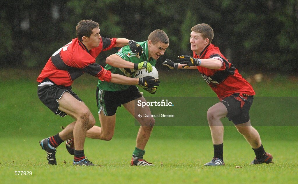 23 November 2011; Enda Dennehy, Colaiste Chríost Rí, in action against Sam Oakes, left, and Darragh O'Connor, right, Colaiste an Spioraid Naoimh. Corn Ui Mhuiri Senior 'A' Football Championship, Colaiste an Spioraid Naoimh v Colaiste Chríost Rí, Ballincollig GAA Club, Co. Cork. Picture credit: Diarmuid Greene / SPORTSFILE
