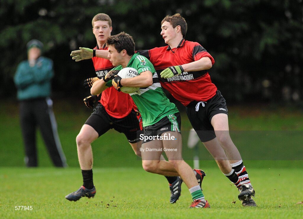 23 November 2011; Stephen Cronin, Colaiste Chríost Rí, in action against Darragh O'Connor, left, and Michael Collins, Colaiste an Spioraid Naoimh. Corn Ui Mhuiri Senior 'A' Football Championship, Colaiste an Spioraid Naoimh v Colaiste Chríost Rí, Ballincollig GAA Club, Co. Cork. Picture credit: Diarmuid Greene / SPORTSFILE