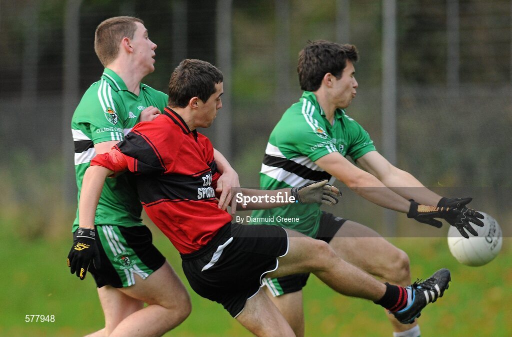 23 November 2011; Sam Oakes, Colaiste an Spioraid Naoimh, shoots for goal despite the efforts of Joe Daly, left, and Stephen Cronin, Colaiste Chríost Rí. Corn Ui Mhuiri Senior 'A' Football Championship, Colaiste an Spioraid Naoimh v Colaiste Chríost Rí, Ballincollig GAA Club, Co. Cork. Picture credit: Diarmuid Greene / SPORTSFILE