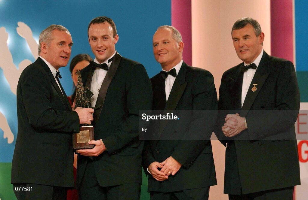 30 November 2001; John Crowley, Kerry receives his award from An Taoiseach Bertie Ahern TD, Paul Donovan, Chief Executive, Eircell Vodafone and Sean McCague, President, Cumann Luthchleas Gael, at the Eircell Vodafone AllStar Awards at the CityWest Hotel, Dublin. Football. Picture credit; Ray McManus / SPORTSFILE