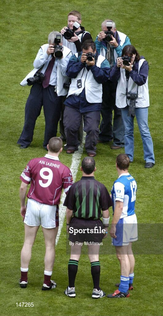 18 July 2004; Rival captains Chris Conway, Laois, and David O'Shaughnessy, Westmeath, stand with referee Pat McEnaney before the toss.  Bank of Ireland Leinster Senior Football Championship Final, Laois v Westmeath, Croke Park, Dublin. Picture credit; Ray McManus / SPORTSFILE