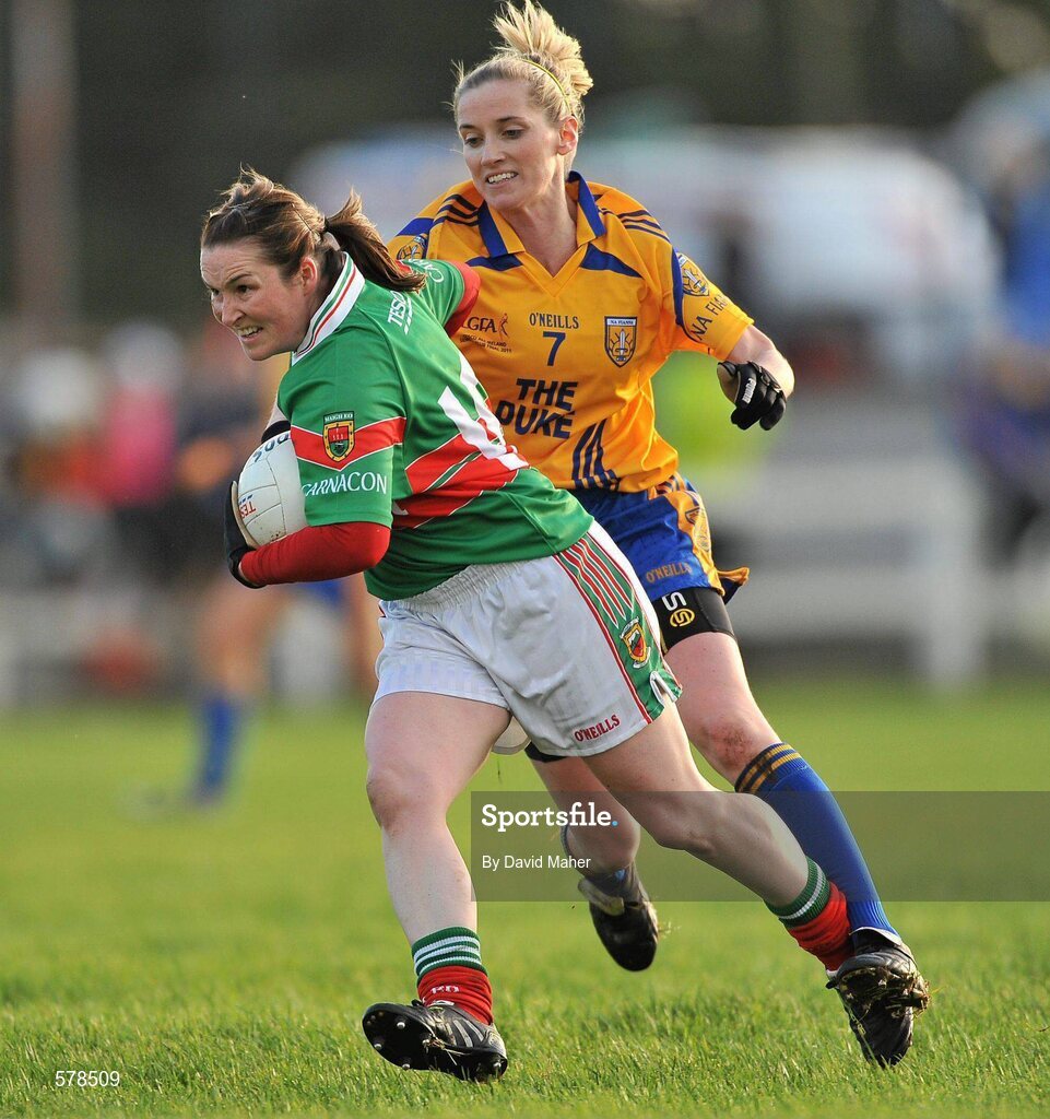 27 November 2011; Michelle McGing, Carnacon, in action against Claire O'Hara, Na Fianna. Tesco All-Ireland Senior Ladies Football Club Championship Final, Carnacon v Na Fianna, Ballymahon, Co. Longford. Picture credit: David Maher / SPORTSFILE