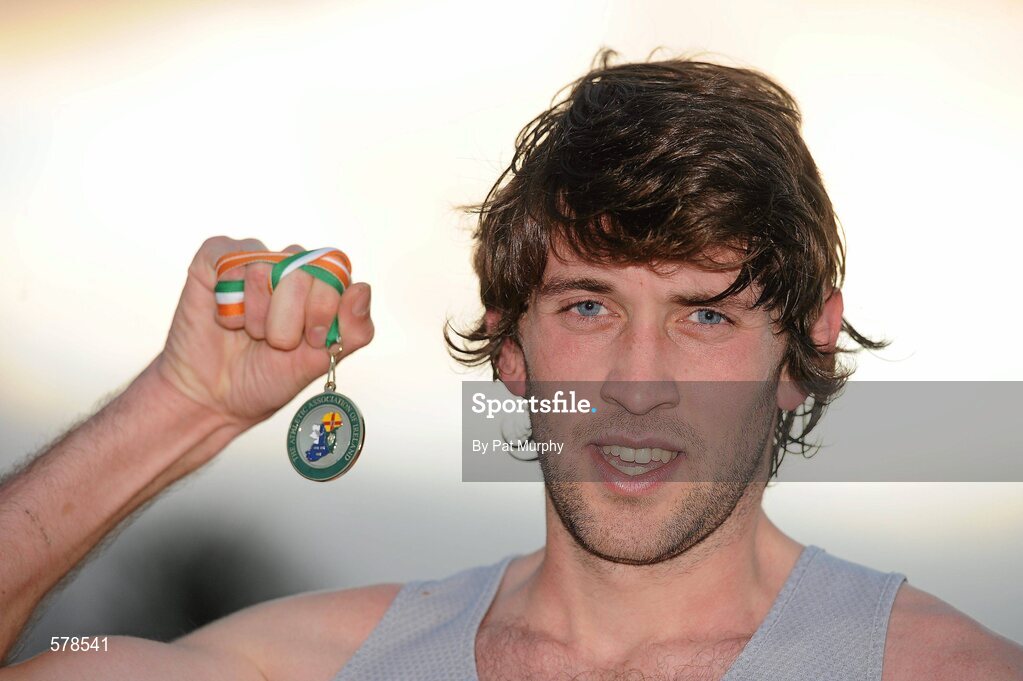 27 November 2011; Joseph Sweeney, Dundrum South Dublin AC, with his gold medal after winning the senior men's race during the Woodie’s DIY Inter County Cross Country Championships. Sligo Racecourse, Sligo. Picture credit: Pat Murphy / SPORTSFILE