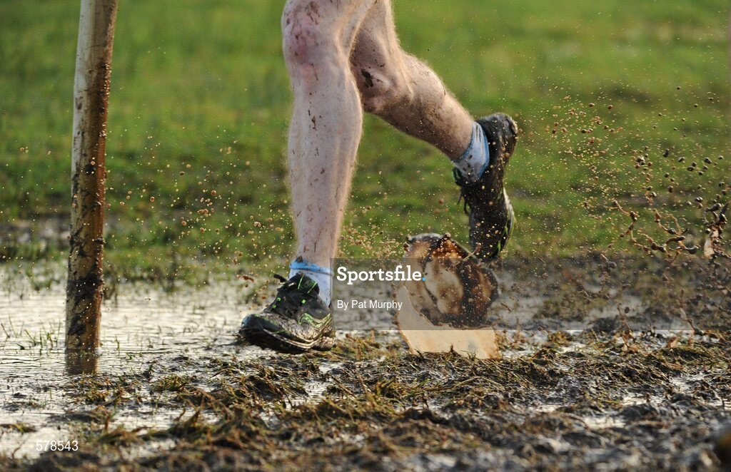 27 November 2011; An athlete makes their way through the mud during the senior men's race at the Woodie’s DIY Inter County Cross Country Championships. Sligo Racecourse, Sligo. Picture credit: Pat Murphy / SPORTSFILE