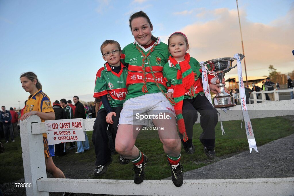 27 November 2011; Michelle McGing, Carnacon, with her son Conor, age 6, and daughter Shauna, age 4, celebrate after winning the Tesco All-Ireland Senior Ladies Football Club Championship Final. Tesco All-Ireland Senior Ladies Football Club Championship Final, Carnacon v Na Fianna, Ballymahon, Co. Longford. Picture credit: David Maher / SPORTSFILE