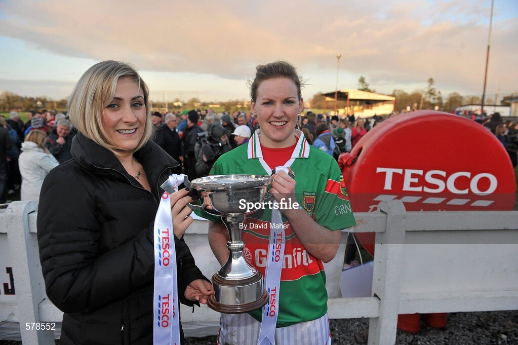 27 November 2011; Carnacon captain Fiona McHale with Yvonne Delaney, Tesco, celebrates after winning the Tesco All-Ireland Senior Ladies Football Club Championship Final. Tesco All-Ireland Senior Ladies Football Club Championship Final, Carnacon v Na Fianna, Ballymahon, Co. Longford. Picture credit: David Maher / SPORTSFILE