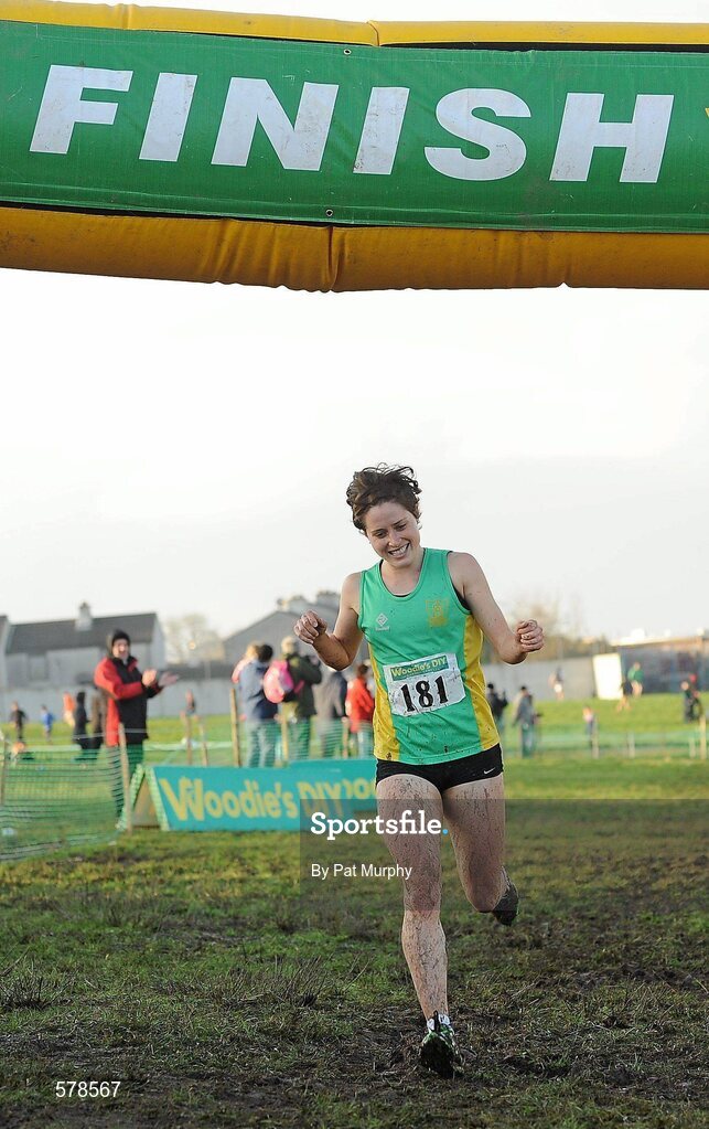27 November 2011; Sarah Louise Treacy, Meath, crosses the finish line to win the senior women's race at the Woodie’s DIY Inter County Cross Country Championships. Sligo Racecourse, Sligo. Picture credit: Pat Murphy / SPORTSFILE