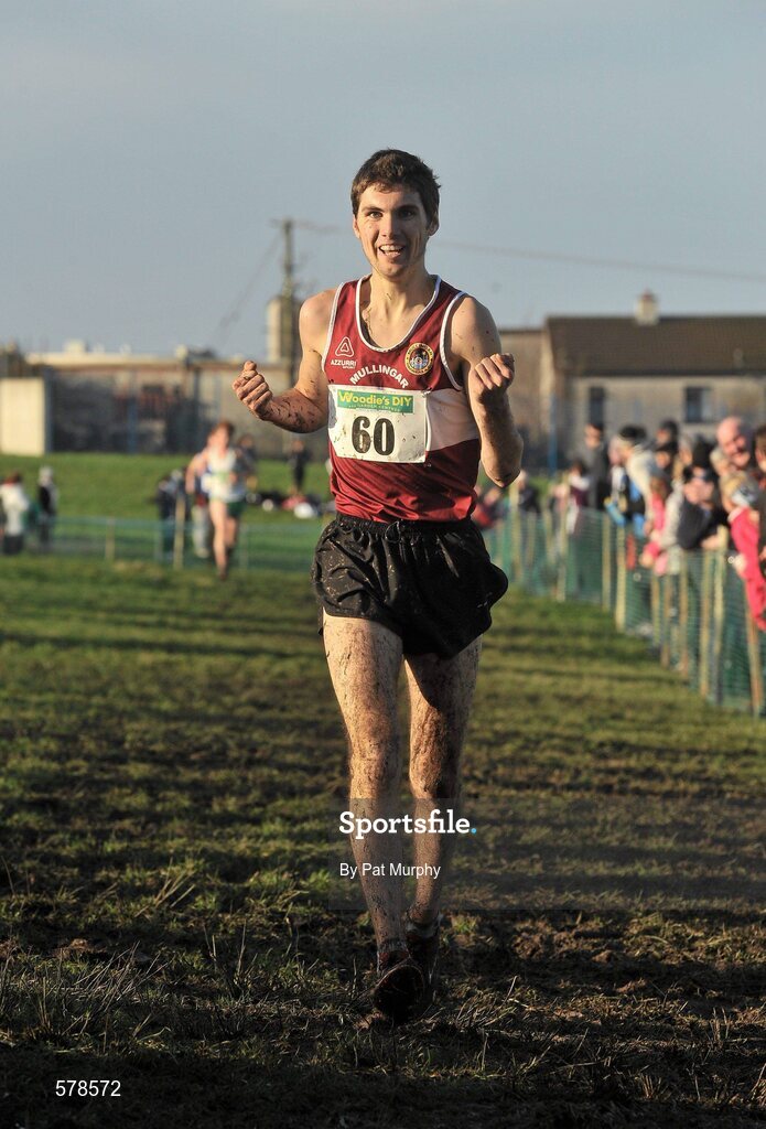 27 November 2011; Jake Byrne, Mullingar Harriers AC, Co. Westmeath, crosses the finish line to win the Junior Men's race at the Woodies DIY Inter County Cross Country Championships. Sligo Racecourse, Sligo. Picture credit: Pat Murphy / SPORTSFILE