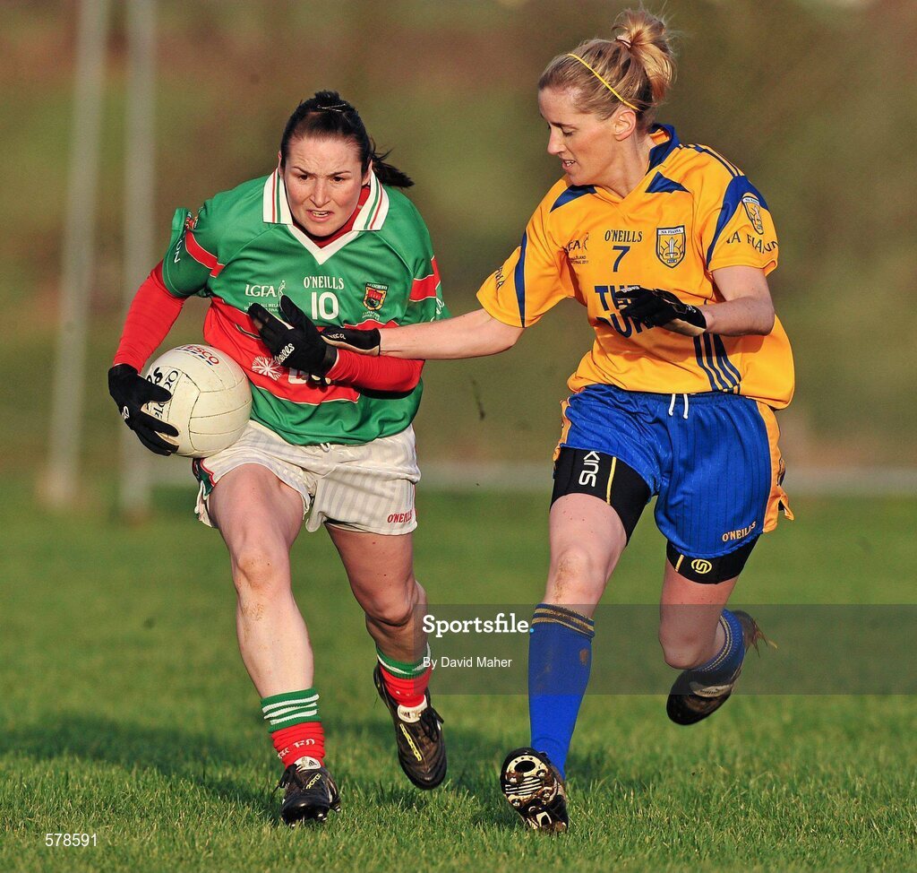 27 November 2011; Michelle McGing, Carnacon, in action against Claire O'Hara, Na Fianna. Tesco All-Ireland Senior Ladies Football Club Championship Final, Carnacon v Na Fianna, Ballymahon, Co. Longford. Picture credit: David Maher / SPORTSFILE