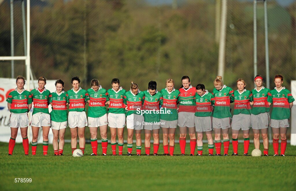 27 November 2011; The Carnacon team stand together during the playing of the National Anthem. Tesco All-Ireland Senior Ladies Football Club Championship Final, Carnacon v Na Fianna, Ballymahon, Co. Longford. Picture credit: David Maher / SPORTSFILE