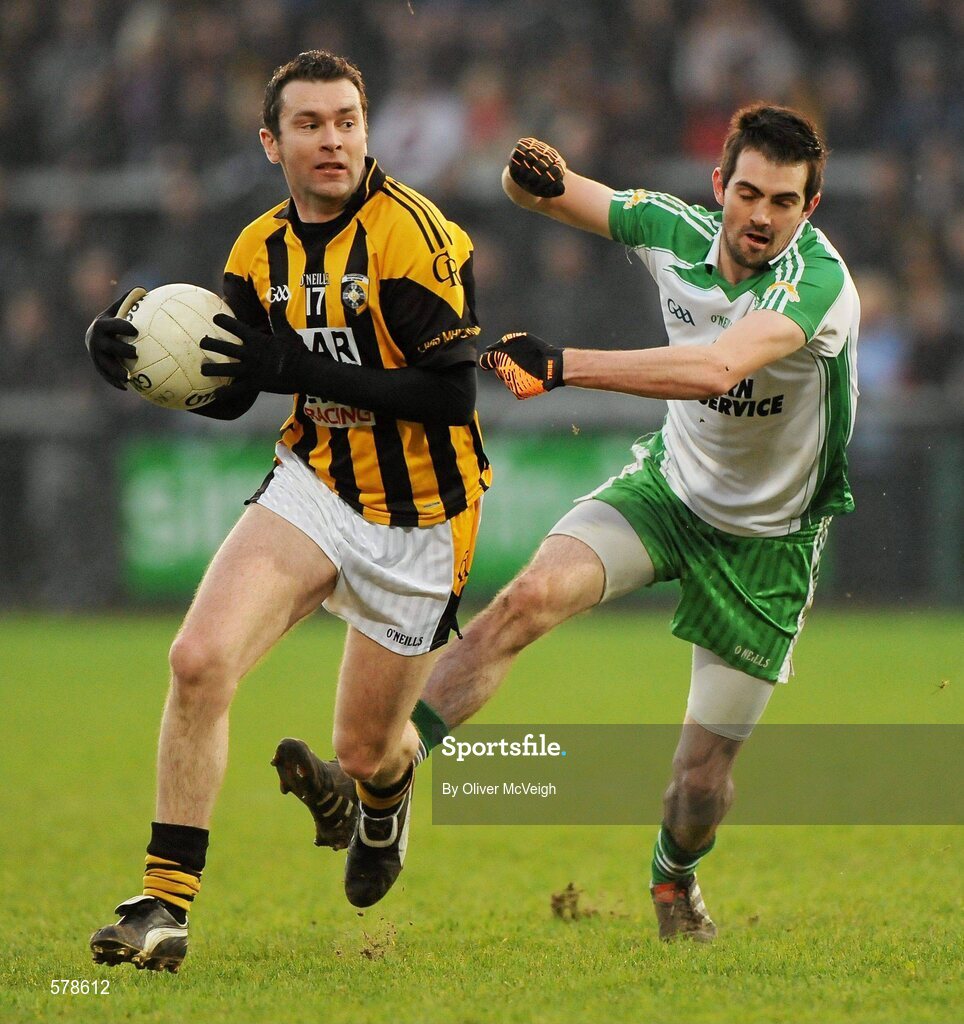 27 November 2011; Oisin McConville, Crossmaglen Rangers, in action against Gerard McCartan, Burren St Mary's. AIB Ulster GAA Football Senior Club Championship Final, Crossmaglen Rangers v Burren St Mary's, Morgan Athletic Grounds, Armagh. Picture credit: Oliver McVeigh / SPORTSFILE