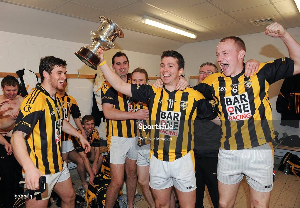 27 November 2011; Captain Stephen Kernan and Danny O'Callaghan, right, celebrate in the changing rooms after the game. AIB Ulster GAA Football Senior Club Championship Final, Crossmaglen Rangers v Burren St Mary's, Morgan Athletic Grounds, Armagh. Picture credit: Oliver McVeigh / SPORTSFILE