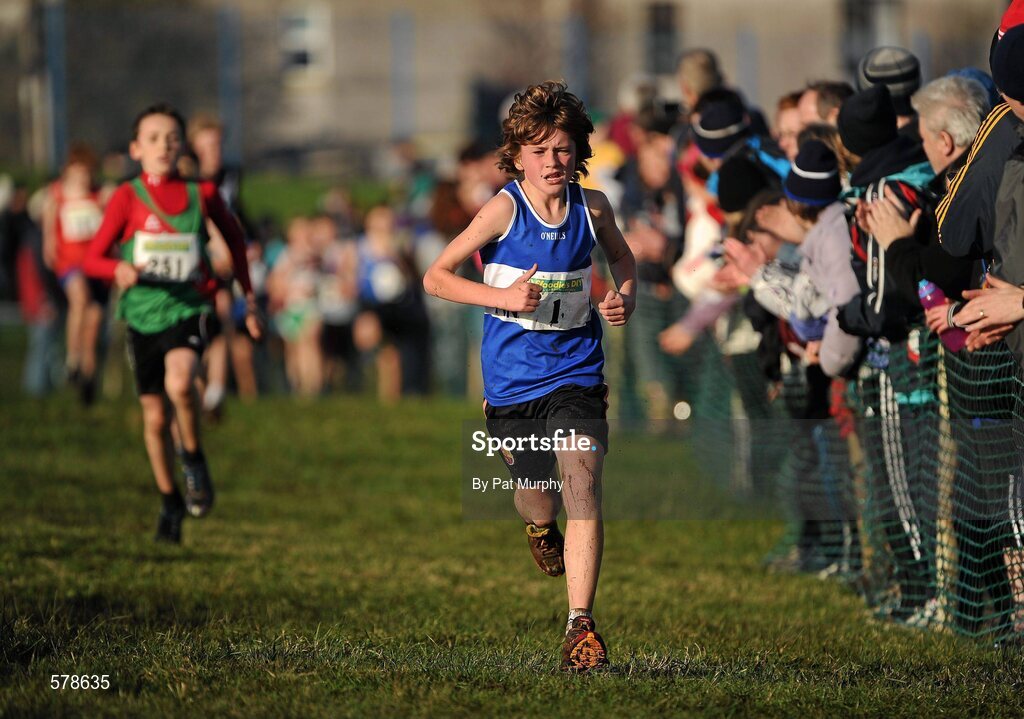 27 November 2011; Aaron McGlynn, Ulster, crosses the finish line to win the Boy's U12 race at the Woodie’s DIY Inter County Cross Country Championships. Sligo Racecourse, Sligo. Picture credit: Pat Murphy / SPORTSFILE