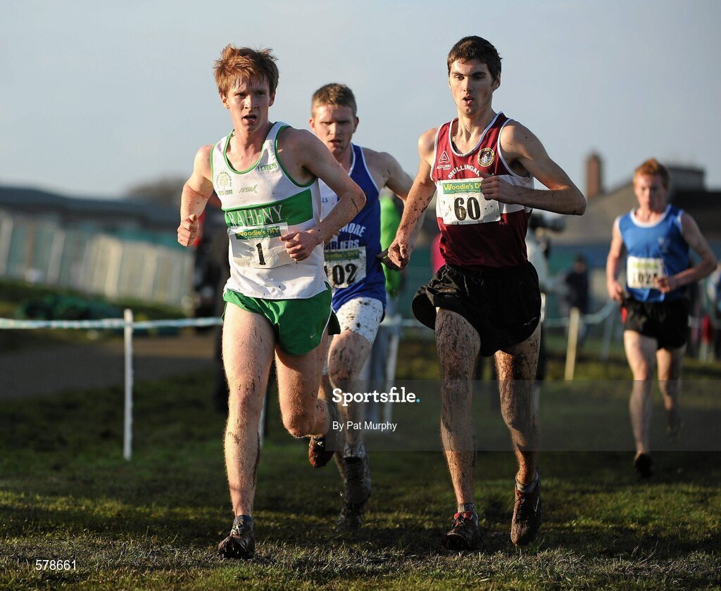 27 November 2011; Eventual winner Jake Byrne, Mullingar Harriers AC, Co. Westmeath, 60, races alongside second placed finisher Kevin Dooney, Raheney Shamrocks AC, Dublin, 1, during the Junior Men's race at the Woodie’s DIY Inter County Cross Country Championships. Sligo Racecourse, Sligo. Picture credit: Pat Murphy / SPORTSFILE