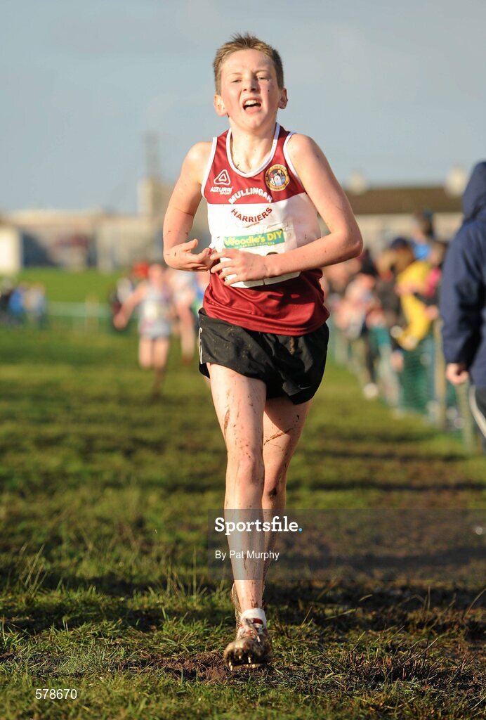 27 November 2011; Cormac Dalton, Mullingar Harriers AC, Co. Westmeath, crosses the finish line to finish in second place in the Boy's U14 race at the Woodie’s DIY Inter County Cross Country Championships. Sligo Racecourse, Sligo. Picture credit: Pat Murphy / SPORTSFILE