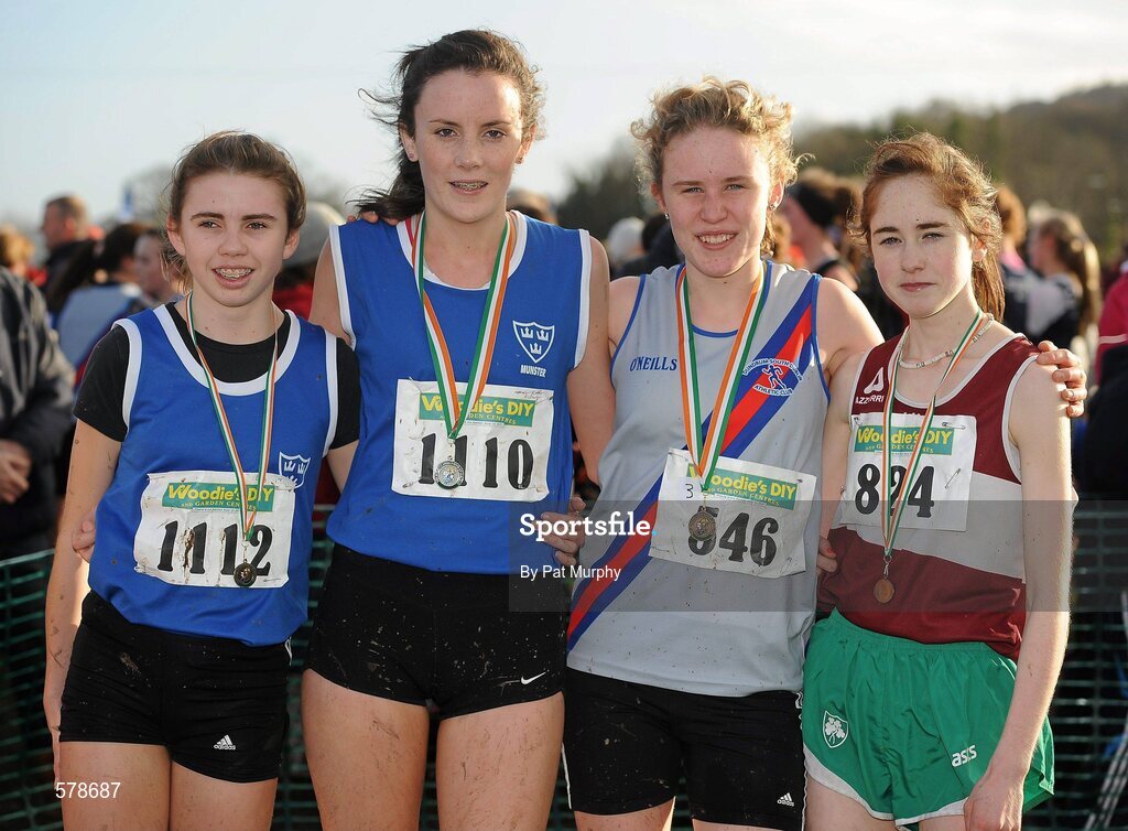 27 November 2011; Athletes, from left, Louise Shanahan, Leevale AC, Cork, Aisling Quinn, Waterford, Sarah Fitzpatrick, Dundrum South Dublin AC, and Linda Conroy, Mullingar Harriers AC, Co. Westmeath, after the Girl's U16 race at the Woodie’s DIY Inter County Cross Country Championships. Sligo Racecourse, Sligo. Picture credit: Pat Murphy / SPORTSFILE