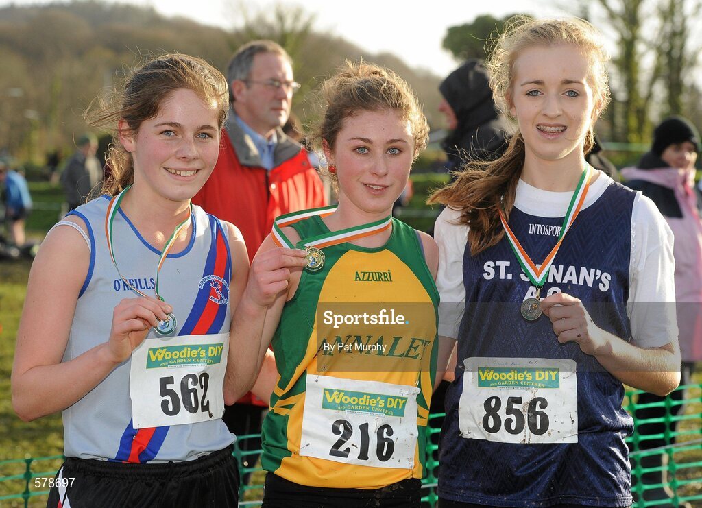 27 November 2011; Gina Dolan, Annalee AC, winner of the Girl's U18 race at the Woodie’s DIY Inter County Cross Country Championships with second placed Sorcha Humphries, Dundrum South Dublin AC, left, and third placed Bronagh Kearns, St. Senans AC, Co. Kilkenny, right. Sligo Racecourse, Sligo. Picture credit: Pat Murphy / SPORTSFILE