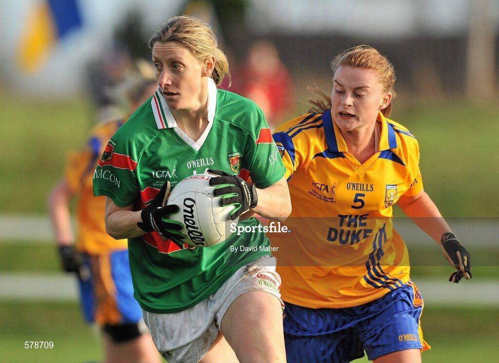 27 November 2011; Cora Staunton, Carnacon, in action against Arlene Cushen, Na Fianna. Tesco All-Ireland Senior Ladies Football Club Championship Final, Carnacon v Na Fianna, Ballymahon, Co. Longford. Picture credit: David Maher / SPORTSFILE