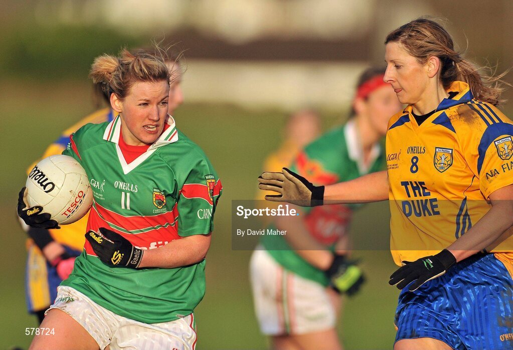 27 November 2011; Fiona McHale, Carnacon, in action against Alma O'Donnell, Na Fianna. Tesco All-Ireland Senior Ladies Football Club Championship Final, Carnacon v Na Fianna, Ballymahon, Co. Longford. Picture credit: David Maher / SPORTSFILE