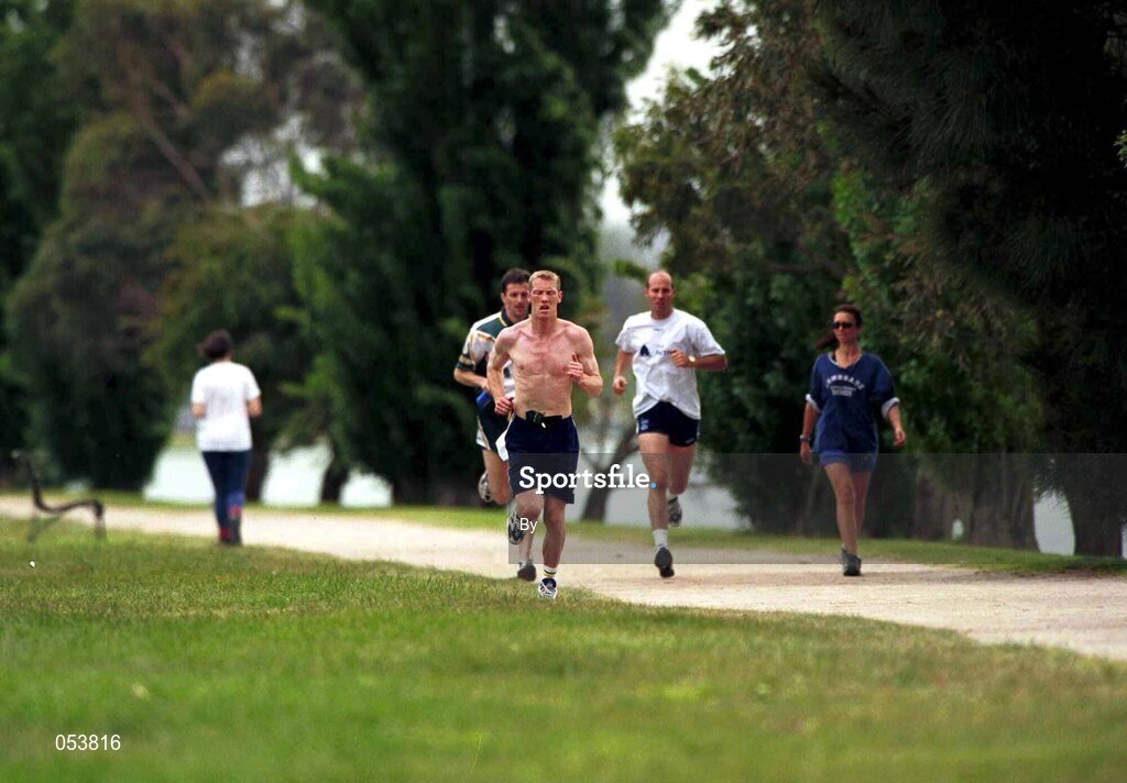 8 October 1999; Graham Gerathy leads colleagues Brian Stynes, right, and Ronan Carolan, the team Chartered Physiotherapist, during a training run around Albert Park, Melbourne, Australia. International Rules. Picture credit, Ray McManus/SPORTSFILE