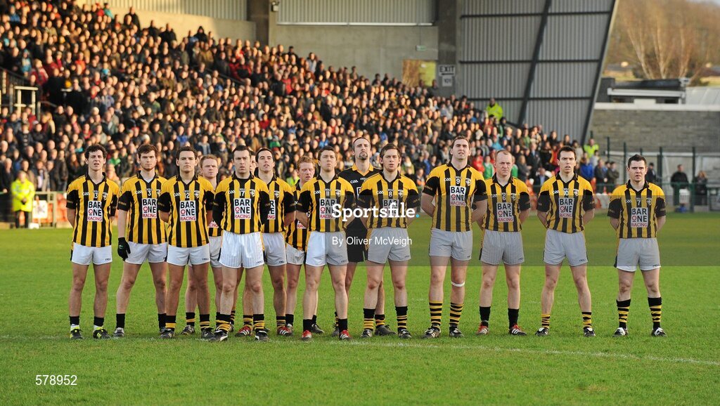 27 November 2011; The Crossmaglen Rangers team stand for the National Anthem. AIB Ulster GAA Football Senior Club Championship Final, Crossmaglen Rangers v Burren St Mary's, Morgan Athletic Grounds, Armagh. Picture credit: Oliver McVeigh / SPORTSFILE