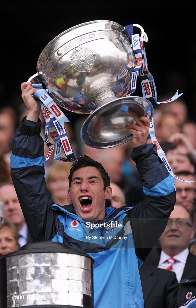 18 September 2011; Nicky Devereux, Dublin, lifts The Sam Maguire Cup. GAA Football All-Ireland Senior Championship Final, Kerry v Dublin, Croke Park, Dublin. Picture credit: Stephen McCarthy / SPORTSFILE